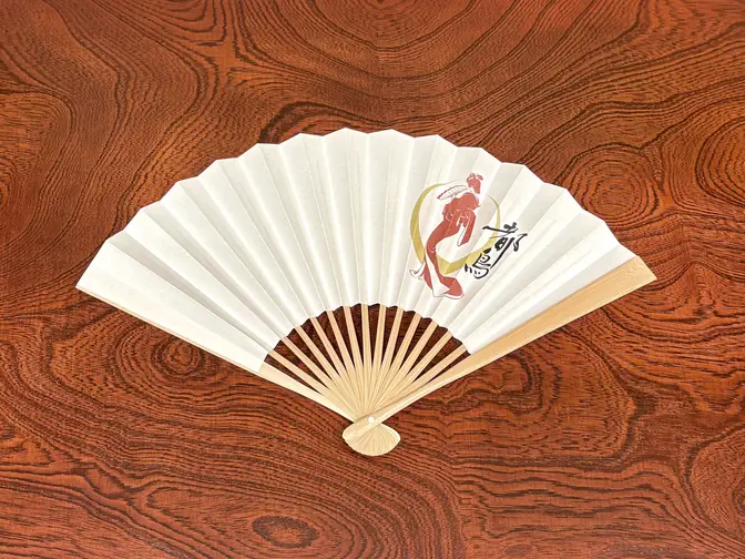 A folding fan printed with the Miyakodori crest